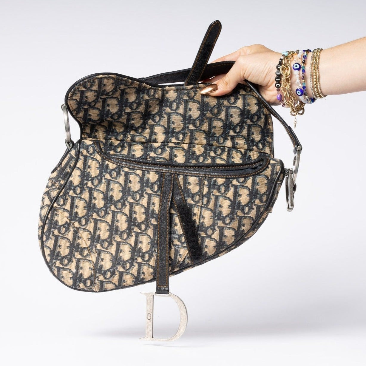 Vintage Dior Saddle Bag - Iconic style and timeless elegance in a classic fashion accessory