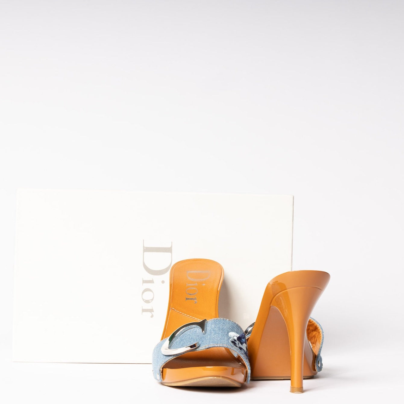 "Vintage Dior Denim Heels - Retro chic and timeless style in iconic footwear for a fashion-forward statement.