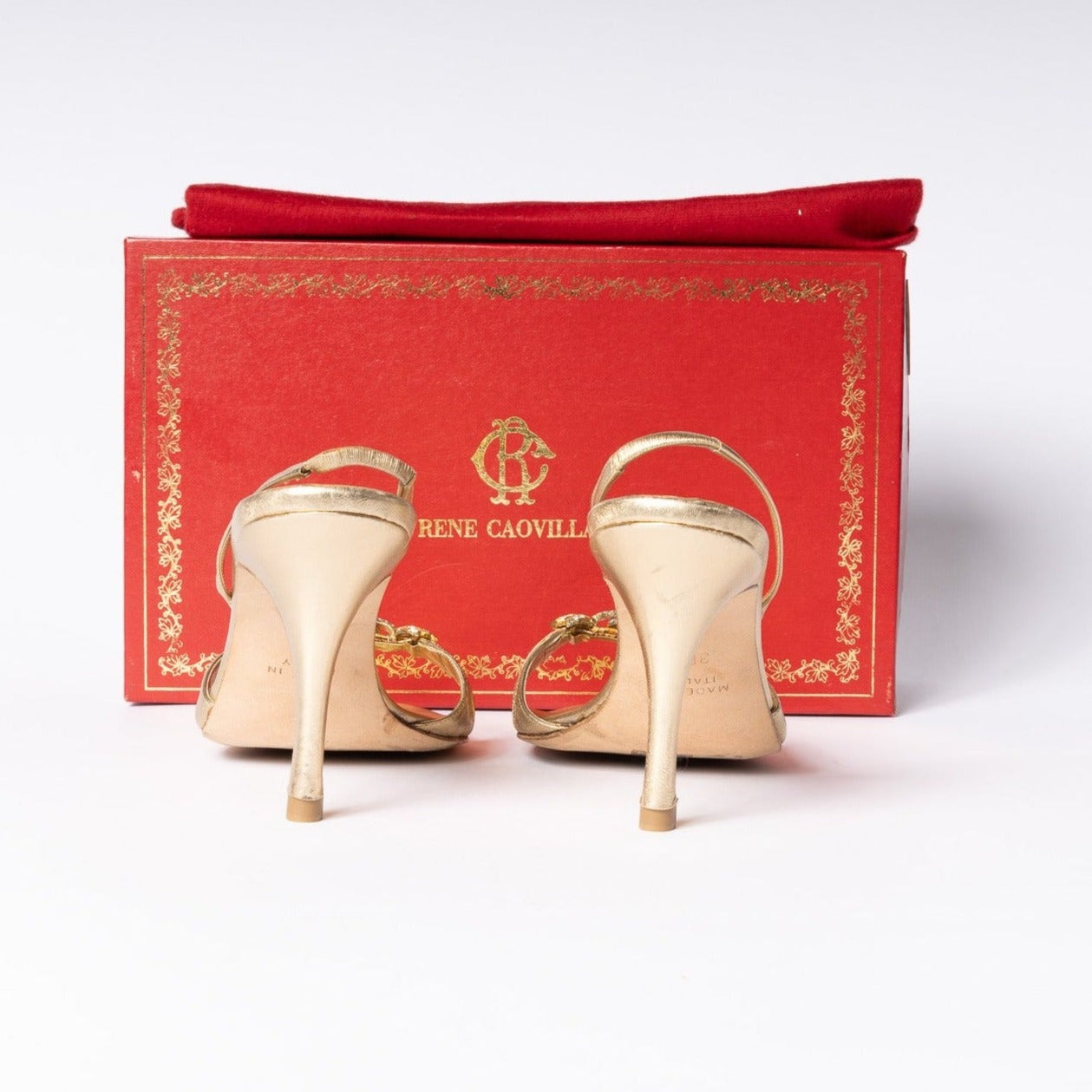 Rene Caovilla Gold Heels - Shimmering elegance and exquisite craftsmanship for a dazzling fashion statement