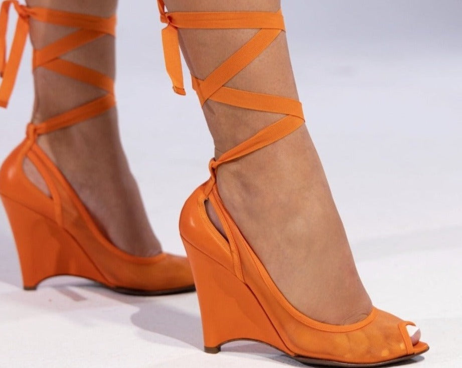 Discover timeless elegance with Fendi Mesh Vintage orange wedge High Heels. Step into classic style and sophistication.