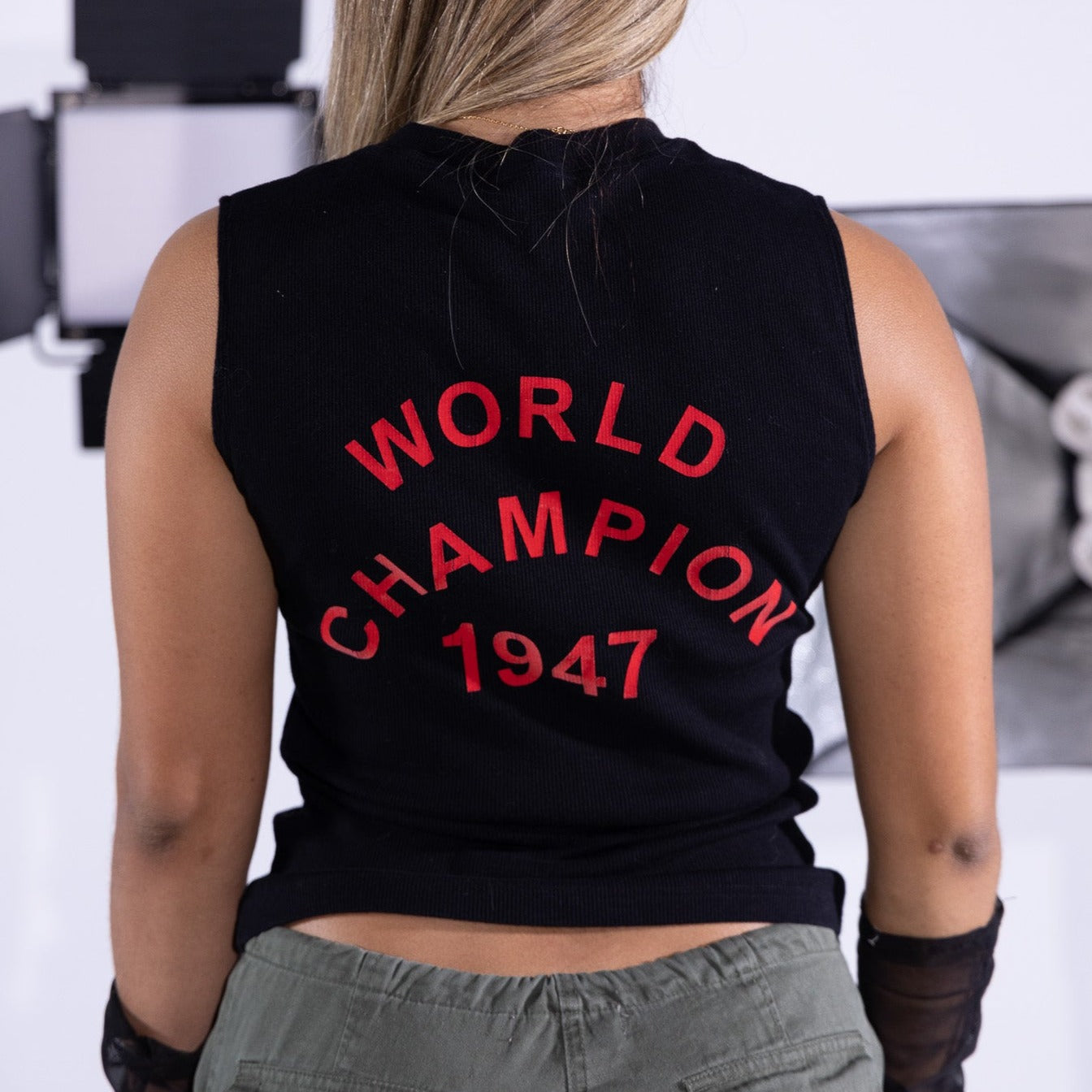 J'adore Dior World Champion 1947 Top. The words “world champion 1947” printed on the back & “j’adore dior” on the front .