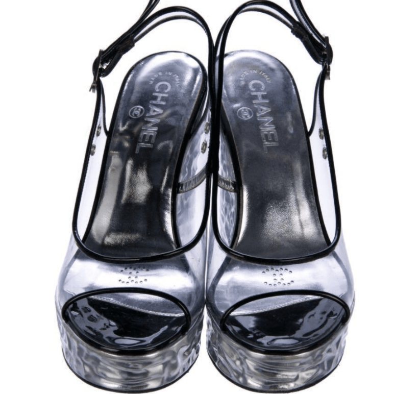 Experience chic comfort with Chanel Clear PVC Wedge Platform Sandals. Elevate your style in sophistication with these iconic heels.