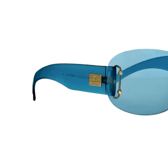 Discover the timeless charm of Gucci's vintage blue sunglasses, a stunning blend of 90's style & contemporary elegance. Shop now!
