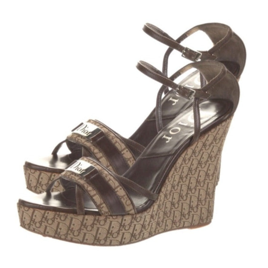 Step into luxury with Dior Diorissimo Wedge Sandals. Embrace elegance and comfort with these iconic wedge sandals