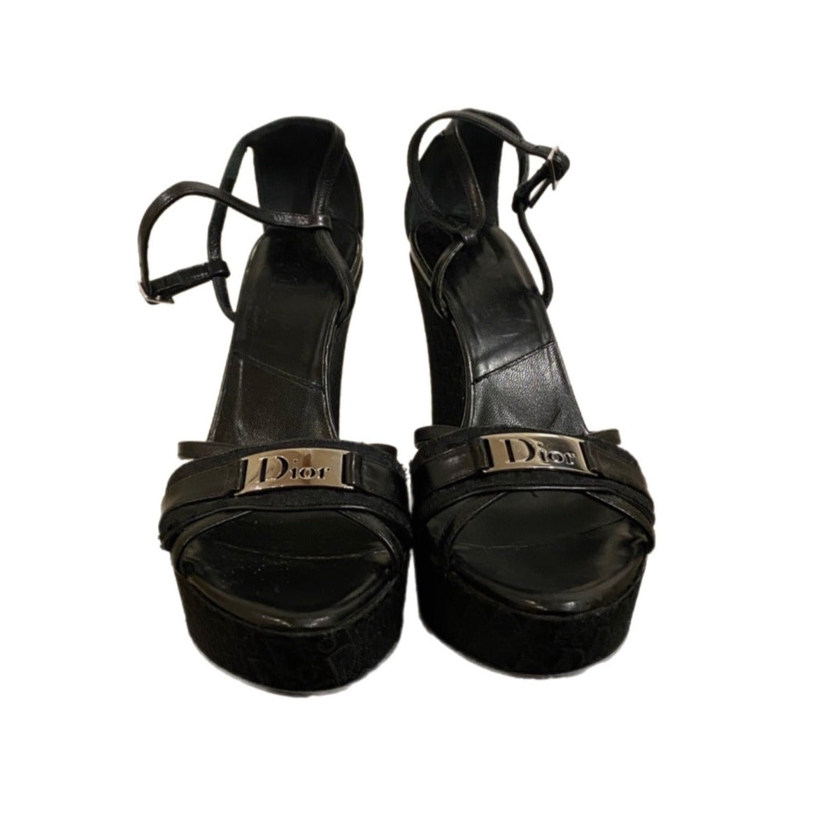 Discover vintage charm with Dior Diorissimo Black Canvas Wedge Sandals. Elevate style in timeless elegance and iconic design.